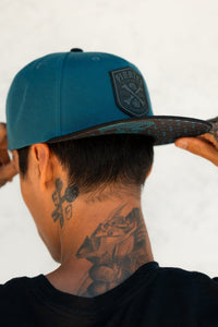 Pirate's Life Teal Snapback
